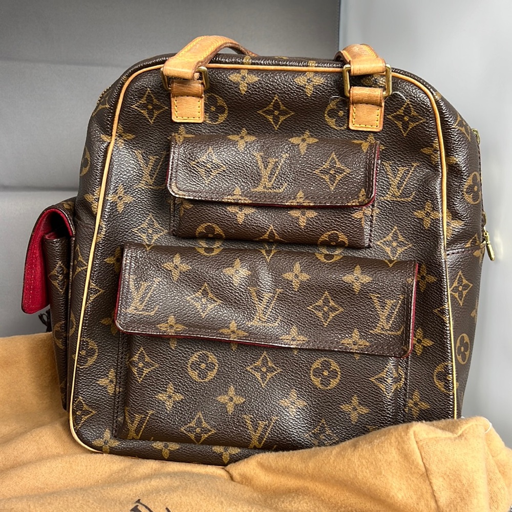 Louis Vuitton M51161 Monogram Exantri Cité Canvas W/original storage Bag and box